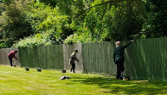 The Abbeyfield Society Marketing Team adds some colour to brighten up Winnersh’s fences Image