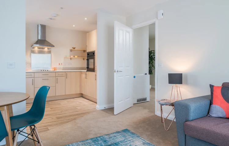 Brightly lit table and seating in a kitchen at Hope Bank View