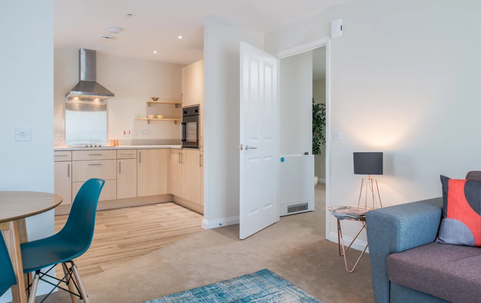 Brightly lit table and seating in a kitchen at Hope Bank View