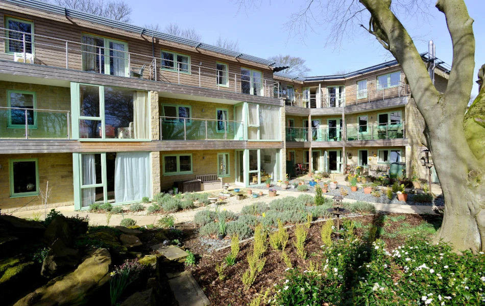 The rear of the house with glass balconies
