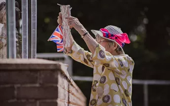 Residents waved their flags with pride Image