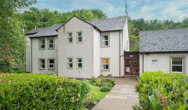 Entrance and front lawn at Abbeyfield House, Cockermouth CA13 9RH