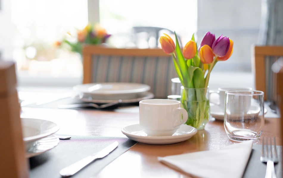 Fresh Tulips On The Dining Table At Abbeyfield House