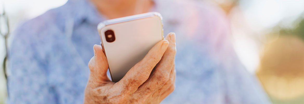 Older woman browsing on a smart phone