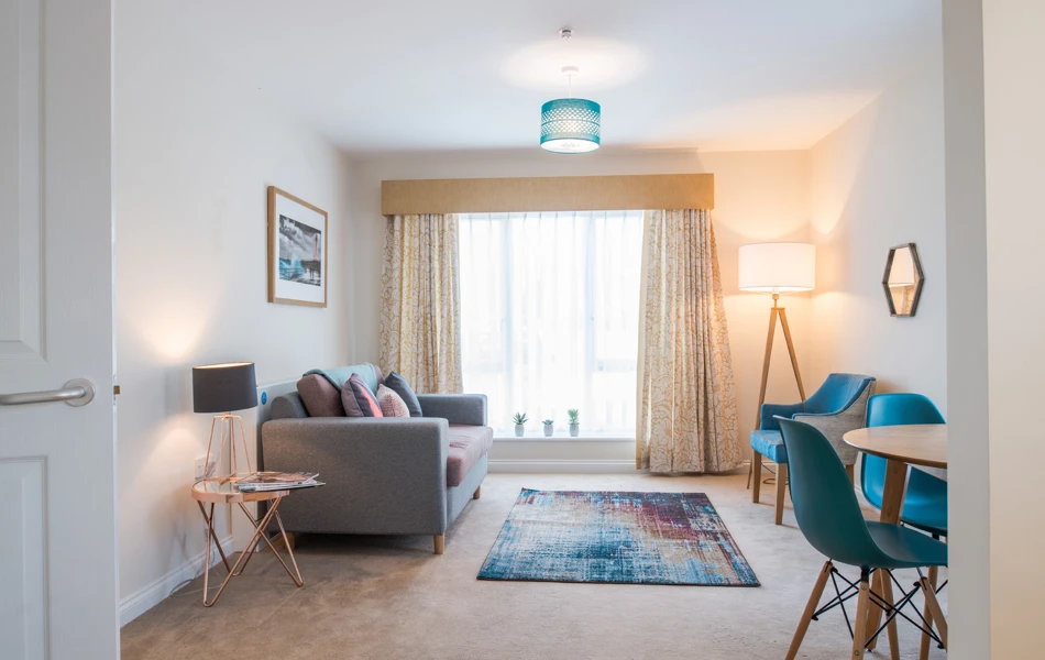 A bright tastefully decorated living room at Hope Bank View