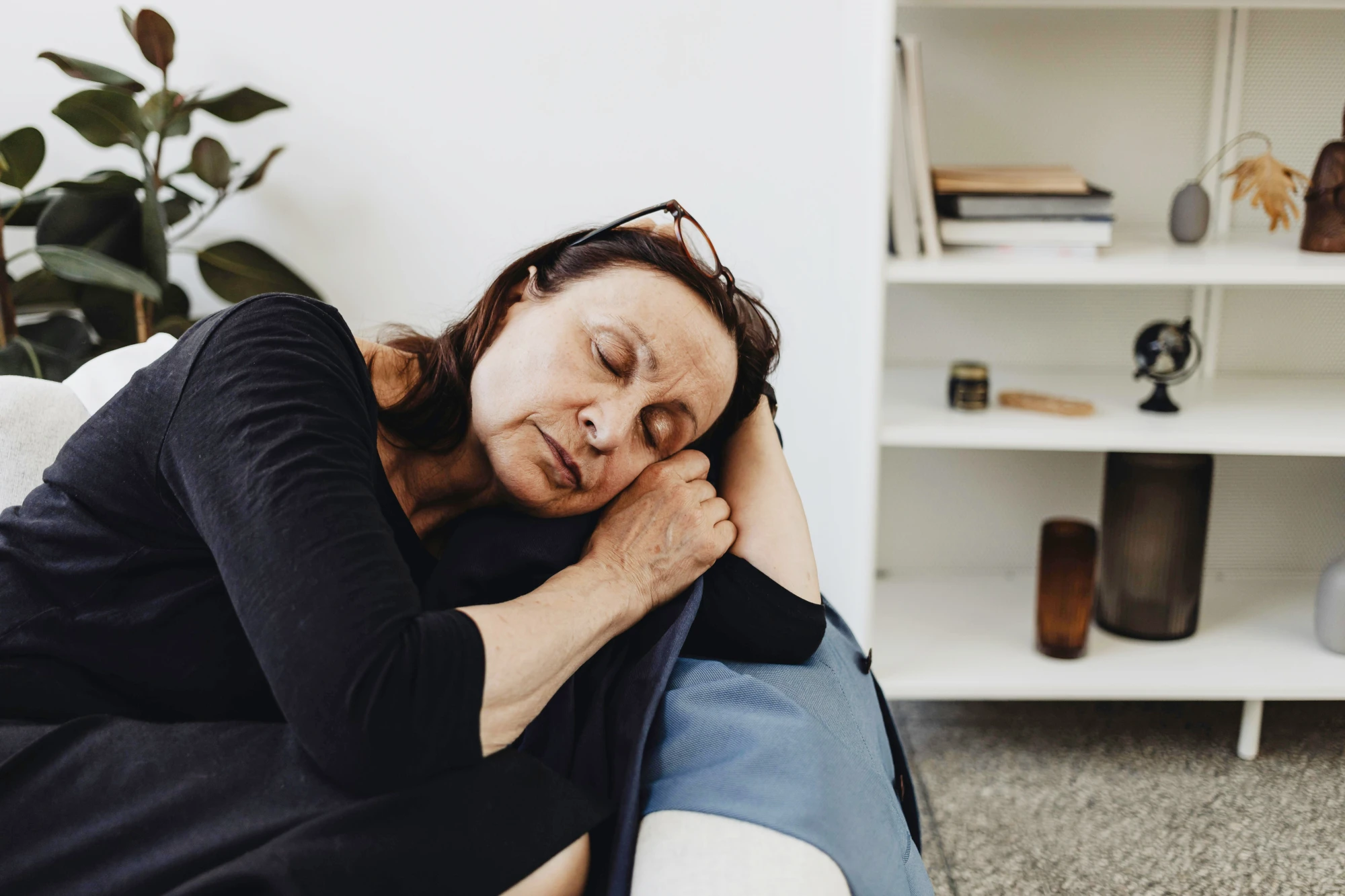 Older woman asleep in a chair